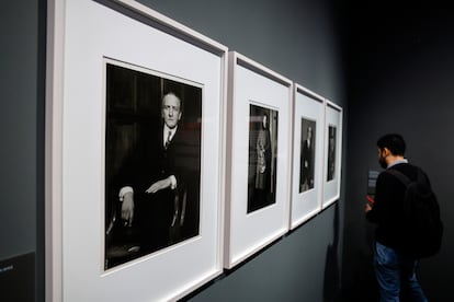 A visitor contemplates August Sander's portraits from the series 'Men of the 20th Century', in the exhibition 'Uncertain Times. Germany between the wars'.