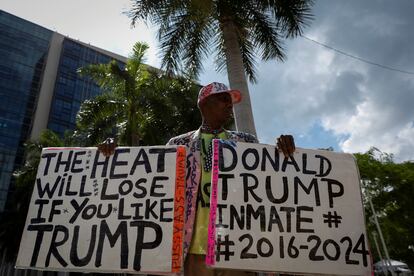 A Trump supporter protests outside the Miami courthouse, where the former president will appear on Tuesday.