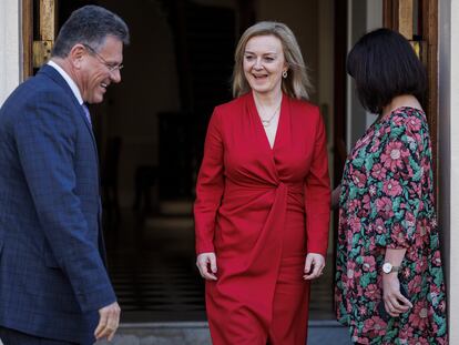 Vice-President of the European Commission Maros Sefcovic is greeted by UK Foreign Secretary Liz Truss outside No 1 Carlton Gardens, in London, Friday, Feb. 11, 2022. Truss held talks in Moscow Thursday, urging Russia to pull back over 100,000 troops amassed near Ukraine and warning that attacking its neighbor would “have massive consequences and carry severe costs.” (Rob Pinney/Pool photo via AP)