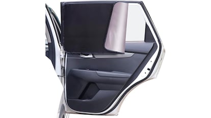 Magnetic car curtain on white background.