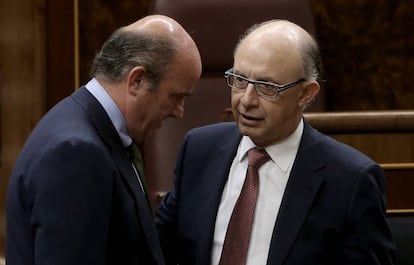 Luis de Guindos and Cristóbal Montoro, economy and finance ministers.