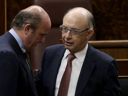 Luis de Guindos and Cristóbal Montoro, economy and finance ministers.