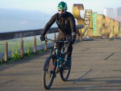 A cyclist in Vitoria, northern Spain this morning.