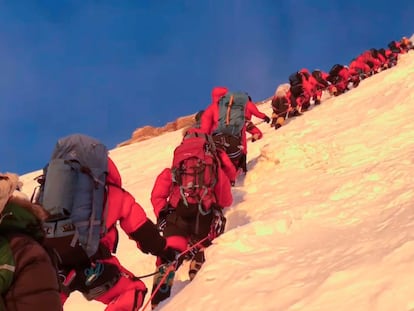 A still from a video uploaded to Instagram by Sherpa Mingma G, showing a queue of climbers on K2 on July 22, 2022.