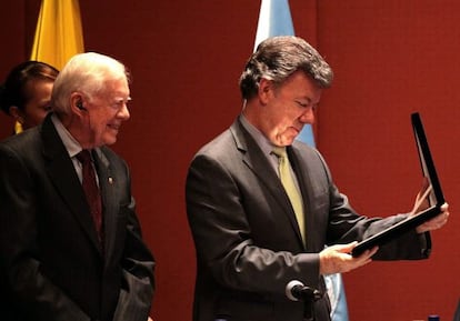 Jimmy Carter y Juan Manuel Santos.