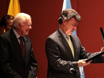 Jimmy Carter y Juan Manuel Santos.