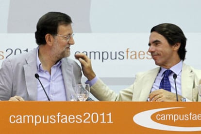 Mariano Rajoy y José María Aznar, en la clausura del Campus FAES 2011, celebrado en Navacerrada.