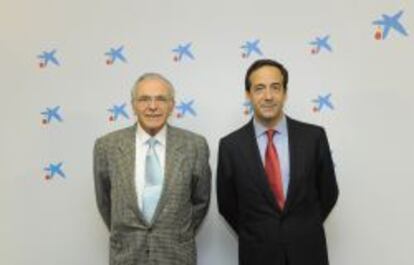 Isidro Fain&eacute;, presidente de CaixaBank, con su consejero delegado, Gonzalo Gort&aacute;zar.