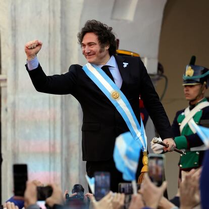 Argentine President Javier Milei holds out his right fist during a ceremony celebrating the 214th anniversary of the May Revolution, which marked the beginning of the country's independence from Spain, in Cordoba, Argentina, Saturday, May 25, 2024. (AP Photo/Nicolas Aguilera)