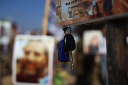 Car keys hang as a memorial at the site where the Nova festival was held.