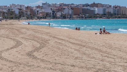 Palma beach in Palma de Mallorca is typically filled with tourists in summer.