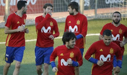 Busquets, Ramos, Piqué y Carvajal, este lunes en Las Rozas.