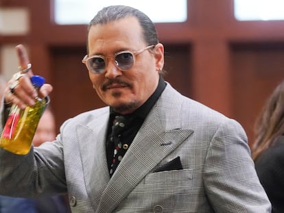 Actor Johnny Depp appears in the courtroom during a break at the Fairfax County Circuit Courthouse in Fairfax, Va., Thursday, May 19, 2022. Actor Johnny Depp sued his ex-wife Amber Heard for libel in Fairfax County Circuit Court after she wrote an op-ed piece in The Washington Post in 2018 referring to herself as a "public figure representing domestic abuse." (Shawn Thew/Pool Photo via AP)