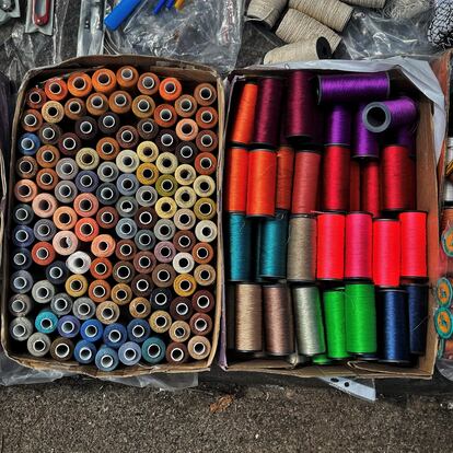 Haberdashery items also have their place, like these colorful bundles of sewing thread.