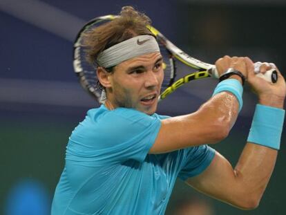 Nadal devuelve una bola a Berlocq en el partido de tercera ronda.