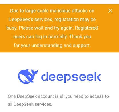 Mensaje de Deepseek en el que advierte de "ataques masivos a gran escala" y que impide el registro de nuevos usuarios.