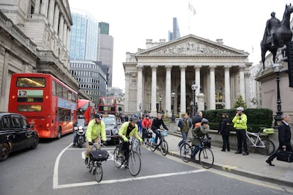 Cyclists in London traffic.