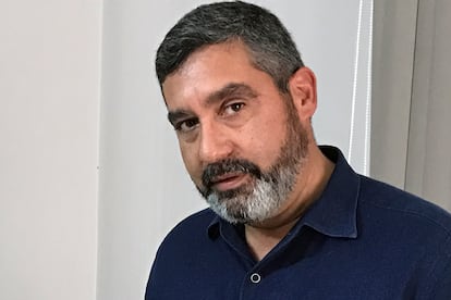 In this April 26, 2017 photo, former Venezuelan Interior Minister Miguel Rodriguez Torres poses for a photo during an interview at his office in Caracas, Venezuela.