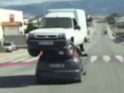 Police seek driver in video where a van is seen precariously sat atop a Ford Focus. Man making recording is also being sought