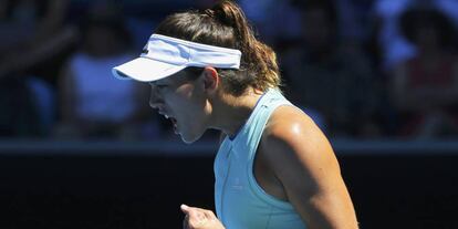 Muguruza celebra un punto frente a Erakovic.