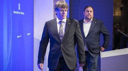 Carles Puigdemont y Oriol Junqueras