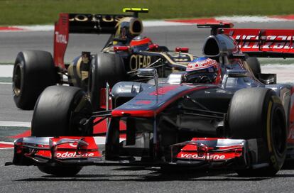 Jenson Button con Romain Grosjean.