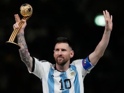 Argentina's Lionel Messi waves after receiving the Golden Ball award for best player of the tournament at the end of the World Cup in Lusail, Qatar, Sunday, Dec. 18, 2022.