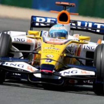 Los pilotos de Renault Fernando Alonso y Nelson Piquet