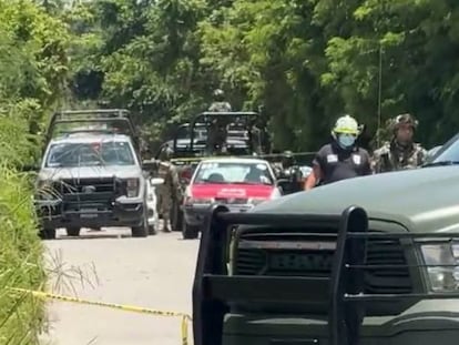 Police at the scene in Tuxpan where a cab driver was shot