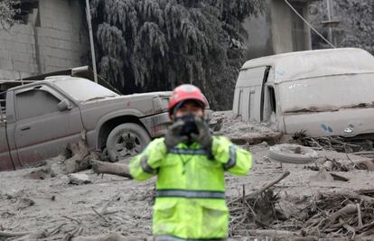 Cars covered by volcanic ash.