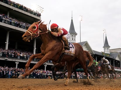 Rich Strike (21), with Sonny Leon aboard, wins the 148th running of the Kentucky Derby