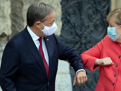 Armin Laschet y Angela Merkel, en Düsseldorf el pasado agosto.