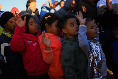 Ni?os migrantes que viajan con sus familias y buscan asilo en Estados Unidos en Ciudad Jurez, Mxico, el 18 de diciembre de 2024.