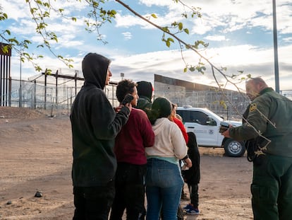 A group of migrants wait to be identified after crossing the Rio Grande River in El Paso, Texas, last April.