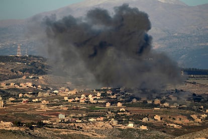 Smoke billows over the southern Lebanese village of Meiss El-Jabbal near the border with Israel following Israeli bombardment on December 26, 2023.