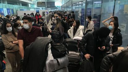 Pasajeros en el aeropuerto Guangzhou Baiyun, en la provincia de Guangdong, al sur de China, el pasado 25 de diciembre.