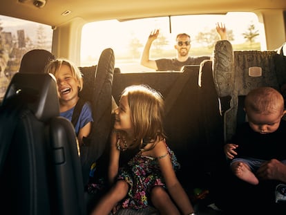 Shot of adorable little children sitting in a car