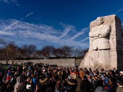 A large group gathers to watch a wreath-laying ceremony at the Martin Luther King Jr. Memorial on Martin Luther King Jr. Day in Washington, Monday, Jan. 16, 2023.