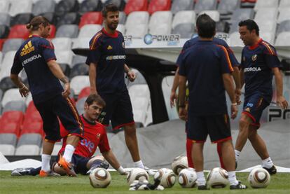 Ramos, Casillas, Piqué y Xavi, durante la sesión de entrenamiento.
