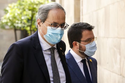 El 'president' Quim Torra (i), acompañado del 'vicepresident' Pere Aragonés (d), el pasado martes en el Palau