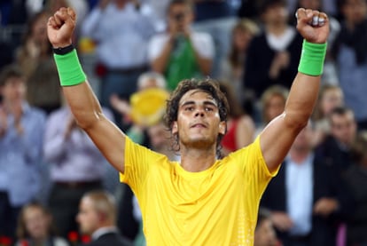 Nadal celebra su victoria ante Federer.