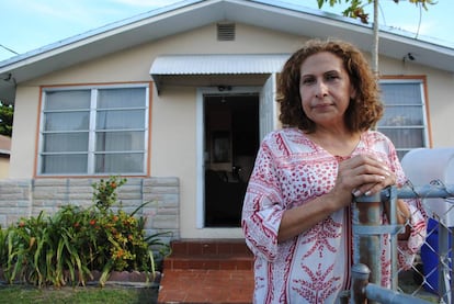 María Edith Lau outside her house in Miami.