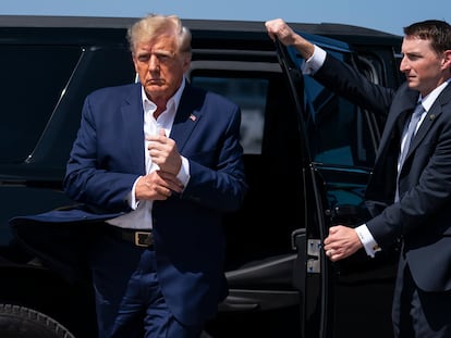 Former President Trump at West Palm Beach International Airport on March 25 before boarding a plane for a rally in Waco, Texas.