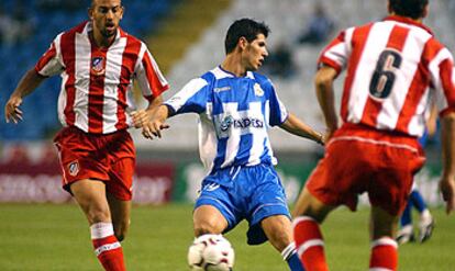 Luque, junto a Colsa, durante el partido de pretemporada frente al Atlético.