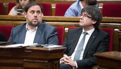 El president de la Generalitat, Carles Puigdemont, amb Oriol Junqueras.