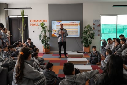 Students and teachers attend a meeting, May 23.  