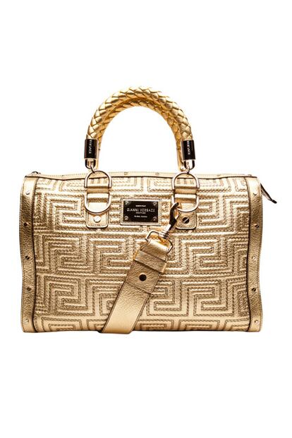 Bolso de mano con asa trenzada, de Versace (2.139 euros).