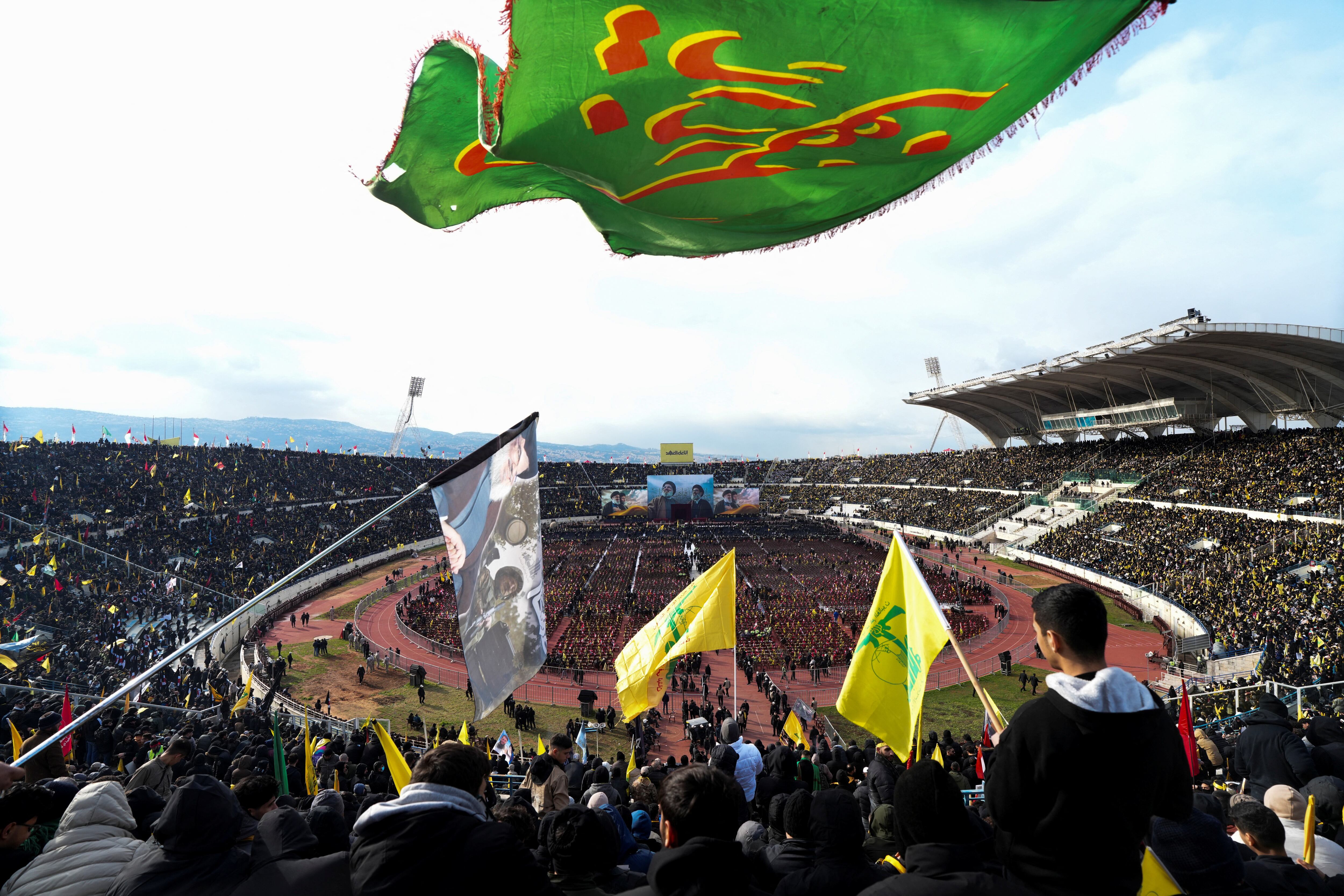 People gather to attend the public funeral ceremony of Hezbollah leaders Hassan Nasrallah and Hashem Safieddine, who were killed during Israeli airstrikes last year, on the outskirts of Beirut, Lebanon February 23, 2025. REUTERS/Ali Allouch