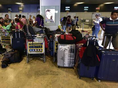 Pasajeros en el aeropuerto Madrid-Barajas.