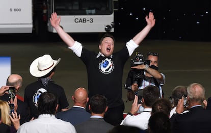 Elon Musk celebrates a successful rocket launch at NASA's Kennedy Space Center.